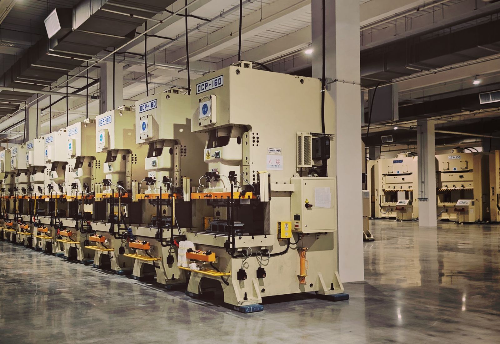 Stamping presses on a manufacturing plant floor