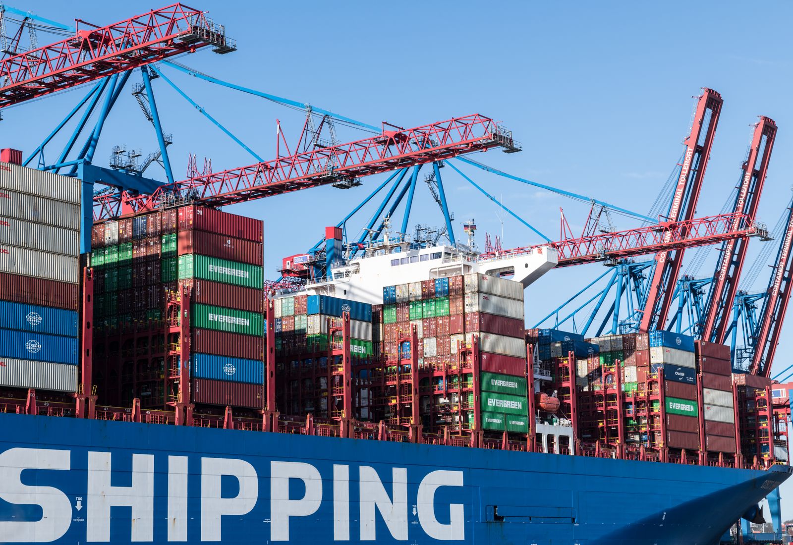 Shipping containers and gantry cranes at a port